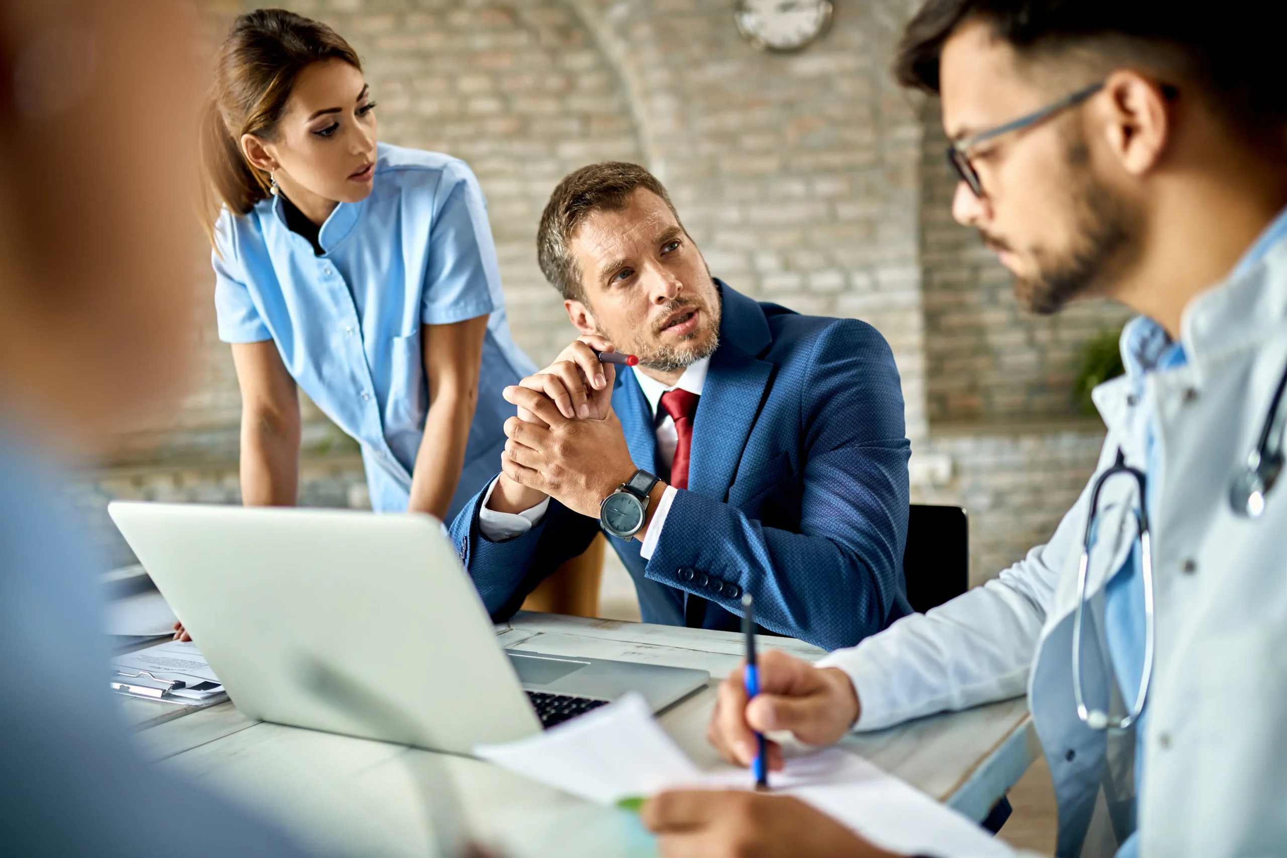 Executive leading adoption work with clinical staff